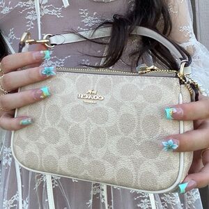 Coach Beige Signature Clutch